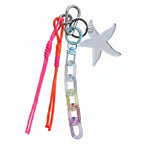 Pink and orange nautical rope bag charm with acrylic chain and silver starfish pendant – product view