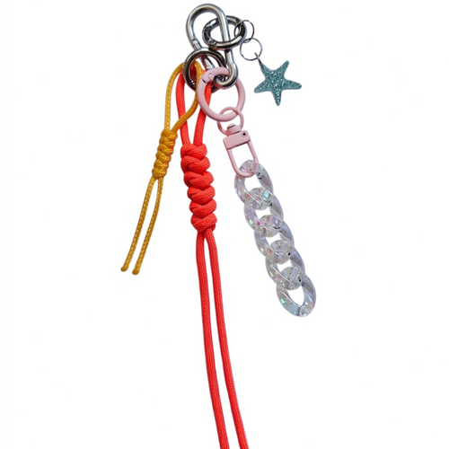 Peach and orange nautical rope bag charm with iridescent acrylic chain and teal starfish pendant – product view