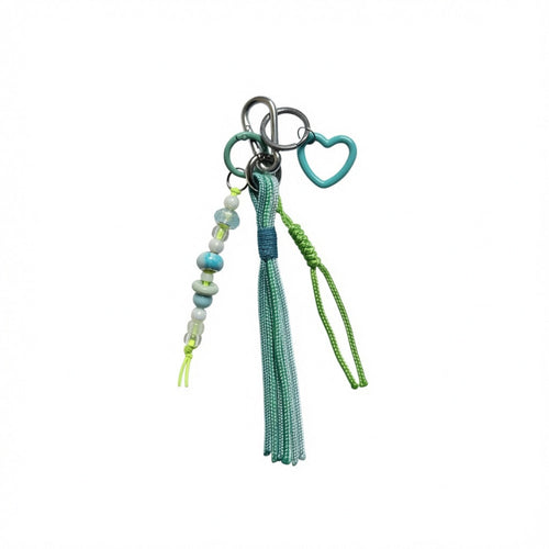 Teal and green nautical rope tassel bag charm with beaded strand and teal heart pendant – product view