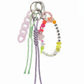 Purple and green nautical rope bag charm with pink acrylic chain and colorful beaded "Summer" loop – product view