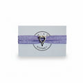 Purple elastic bracelet with silver heart charm on Mint Sorbet packaging card