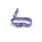 Purple elastic bracelet with silver heart charm – product view