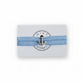 Blue elastic bracelet with silver anchor charm on Mint Sorbet packaging card