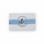 Blue elastic bracelet with silver anchor charm on Mint Sorbet packaging card