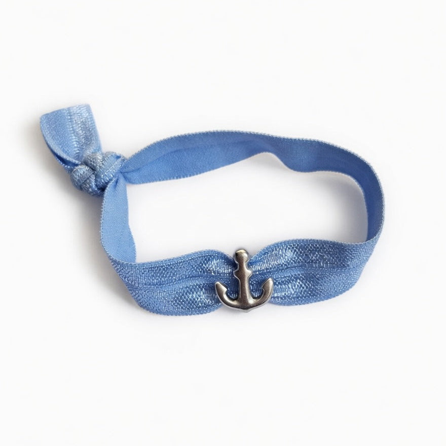 Blue elastic bracelet with silver anchor charm – product view
