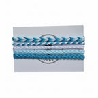Blue, white and light blue hand-knotted cotton friendship bracelet set of 5 on Mint Sorbet packaging card