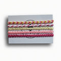 Pink, yellow and cream hand-knotted cotton friendship bracelet set of 5 on Mint Sorbet packaging card