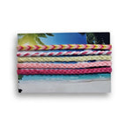 Pink, yellow and cream hand-knotted cotton friendship bracelet set of 5