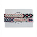 Pink, black and sage green hand-knotted cotton friendship bracelet set of 2 with diamond pattern on Mint Sorbet packaging card