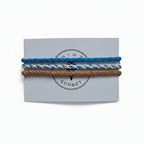 Blue, white and brown hand-knotted cotton friendship bracelet set of 3 on Mint Sorbet packaging card