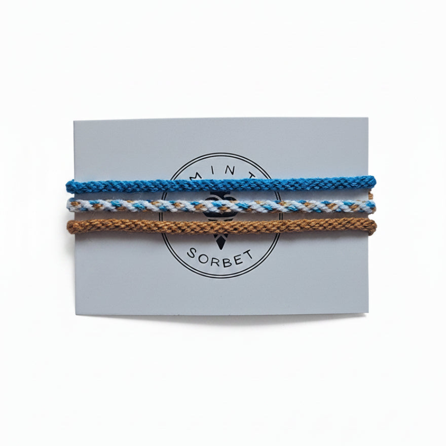 Blue, white and brown hand-knotted cotton friendship bracelet set of 3 on Mint Sorbet packaging card