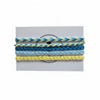 Blue, teal and yellow hand-knotted cotton friendship bracelet set of 5 on Mint Sorbet packaging card