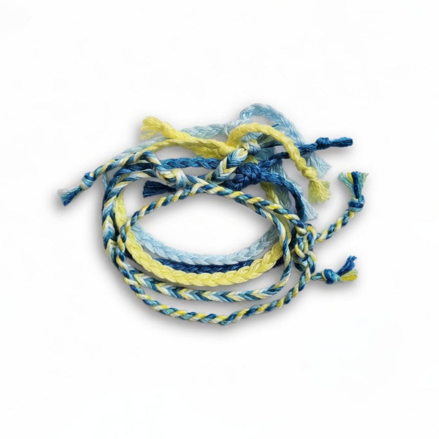 Blue, teal and yellow hand-knotted cotton friendship bracelet set of 5 – product view