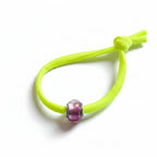 Neon yellow elastic bracelet with pink Murano glass bead – product view