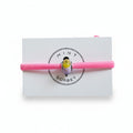 Pink elastic bracelet with multicolor Murano glass bead on Mint Sorbet packaging card