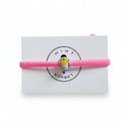 Pink elastic bracelet with multicolor Murano glass bead on Mint Sorbet packaging card