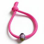 Pink elastic bracelet with multicolor Murano glass bead – product view