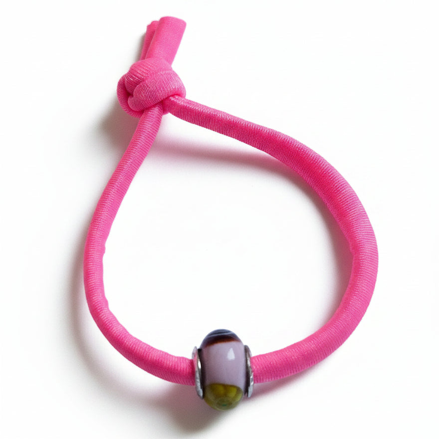 Pink elastic bracelet with multicolor Murano glass bead – product view