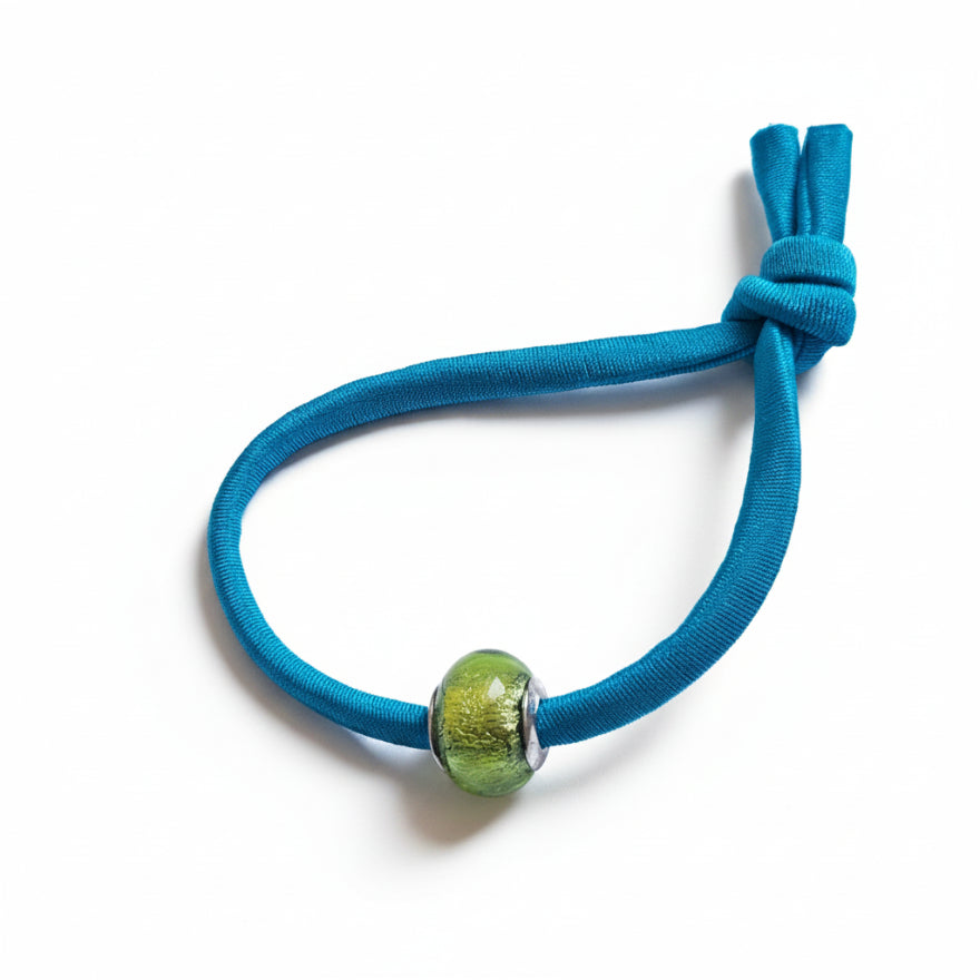 Turquoise elastic bracelet with lime green Murano glass bead – product view