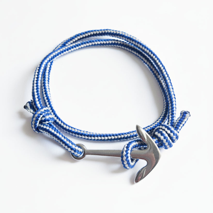 Blue and white striped nautical rope bracelet with silver stainless steel anchor clasp – product view