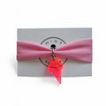 Pink nylon elastic bracelet with neon pink acrylic ice cream cone pendant on Mint Sorbet packaging card