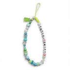 Colorful beaded "Taylor Swift" phone charm with green gummy bear charm – product view