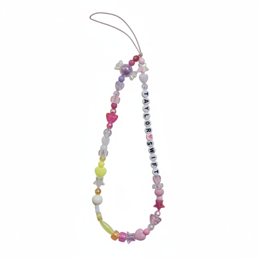 Colorful beaded "Taylor Swift" phone charm with green gummy bear charm – product view