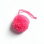 Hot pink cotton and polyacrylic yarn pom pom charm – product view