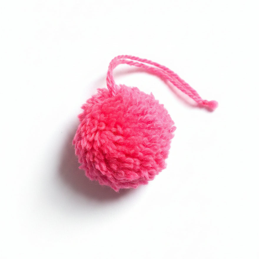 Hot pink cotton and polyacrylic yarn pom pom charm – product view