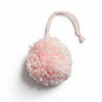 Light pink cotton and polyacrylic yarn pom pom charm – product view