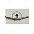 Brown jasper and turquoise amazonite beaded bracelet with silver accent bead on Mint Sorbet packaging card