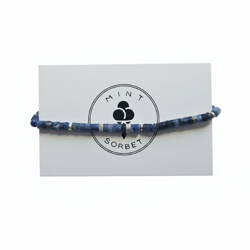 Blue sodalite beaded bracelet with silver accent beads on Mint Sorbet packaging card