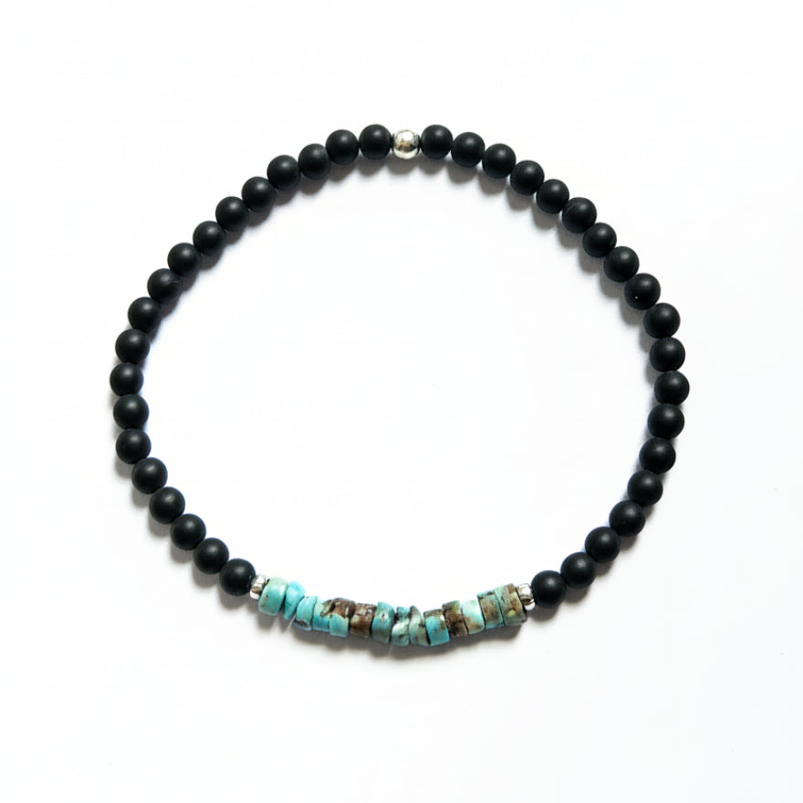 Black onyx and turquoise amazonite beaded bracelet with silver accent bead – product view