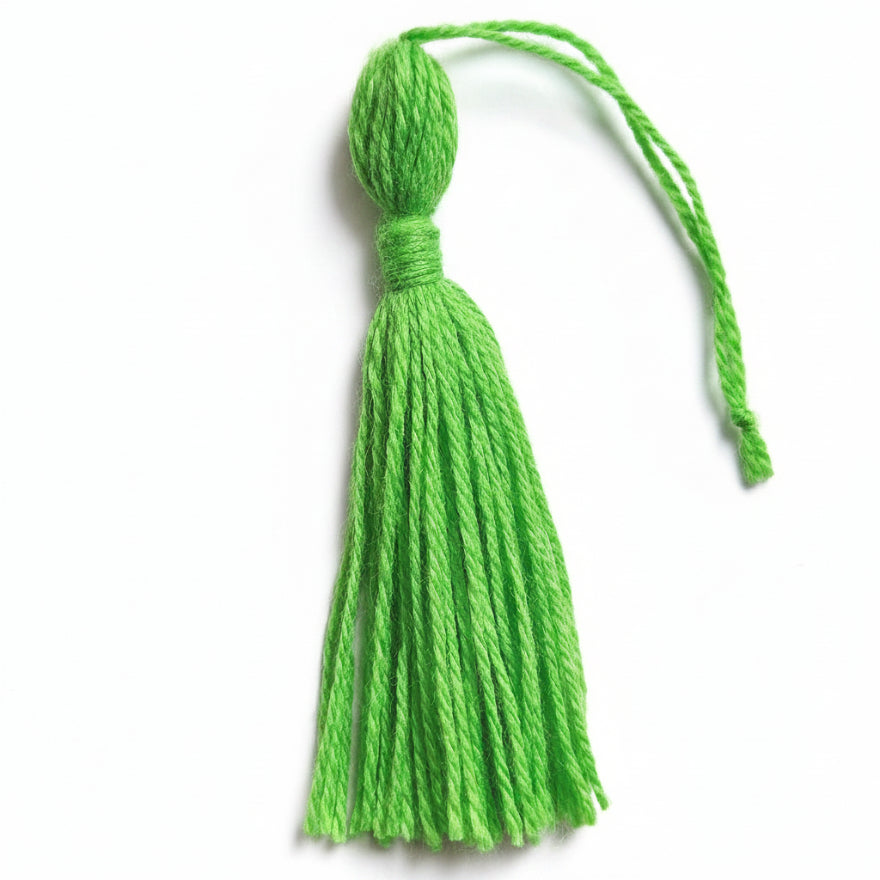 Green cotton and nylon tassel charm – product view